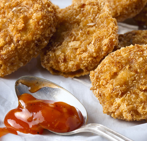 Pépites de poulet multigrains et frites de patates douces Olymel